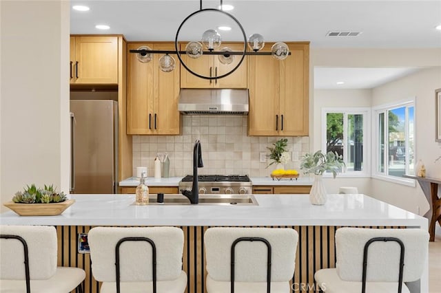 11091 Ranger Dr, Los Alamitos, CA 90720 - kitchen featuring exhaust hood, stainless steel fridge, light brown cabinets, and recessed lighting