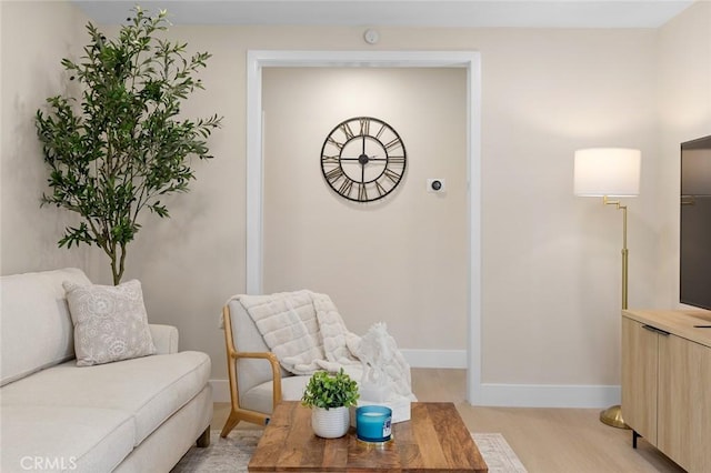 11091 Ranger Dr, Los Alamitos, CA 90720 - living room with light wood-style floors and baseboards