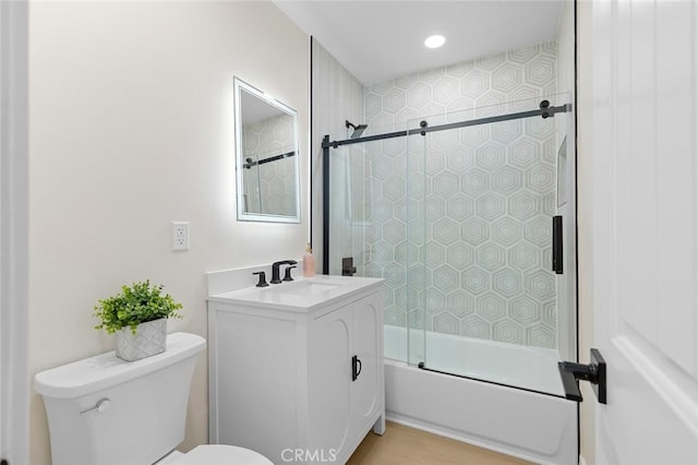 11091 Ranger Dr, Los Alamitos, CA 90720 - bathroom with toilet, vanity, enclosed tub / shower combo, and recessed lighting