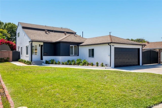 11091 Ranger Dr, Los Alamitos, CA 90720 - view of front of house featuring a gate, an attached garage, concrete driveway, and stucco siding