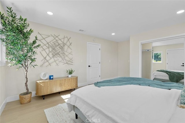 11091 Ranger Dr, Los Alamitos, CA 90720 - bedroom featuring light wood-type flooring, baseboards, and recessed lighting