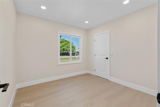 11091 Ranger Dr, Los Alamitos, CA 90720 - unfurnished room featuring light wood-style floors, recessed lighting, and baseboards