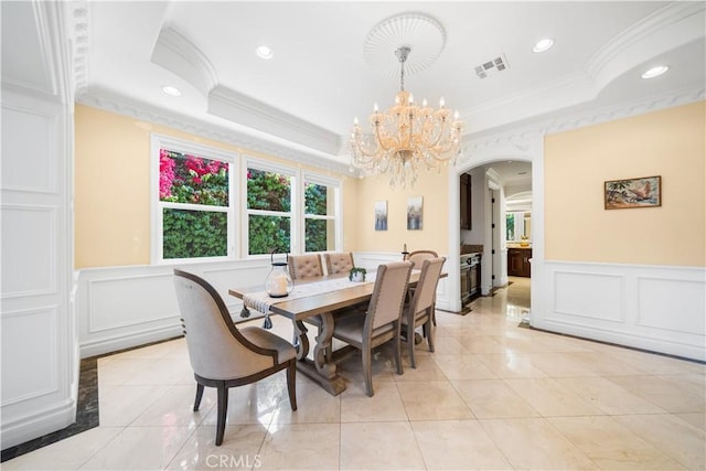 553 Woodward Blvd, Pasadena, CA 91107 - dining room featuring arched walkways, a decorative wall, crown molding, wainscoting, and recessed lighting