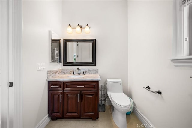 553 Woodward Blvd, Pasadena, CA 91107 - half bath featuring baseboards, vanity, and toilet