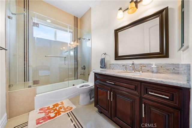 553 Woodward Blvd, Pasadena, CA 91107 - bathroom featuring vanity, toilet, and bath / shower combo with glass door