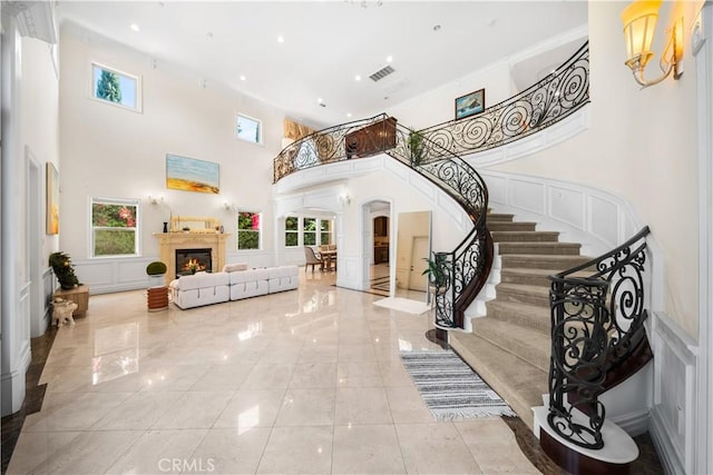 553 Woodward Blvd, Pasadena, CA 91107 - entrance foyer with healthy amount of natural light, arched walkways, a towering ceiling, stairway, and recessed lighting