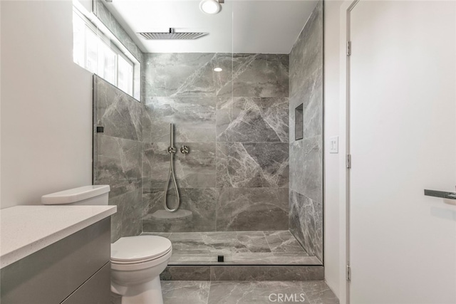 2298 Bigelow Ave, Simi Valley, CA 93065 - full bathroom with marble finish flooring, toilet, tiled shower, and vanity