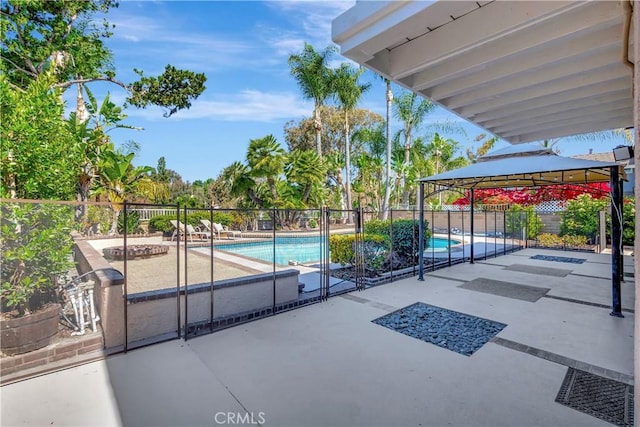 24851 Via Santa Cruz, Mission Viejo, CA 92692 - view of swimming pool with a patio, a gazebo, and a fenced backyard