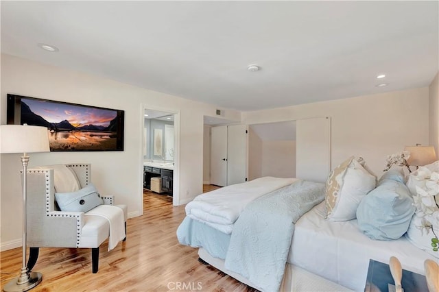 24851 Via Santa Cruz, Mission Viejo, CA 92692 - bedroom featuring light wood finished floors, baseboards, ensuite bath, and recessed lighting
