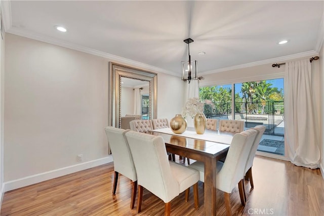 24851 Via Santa Cruz, Mission Viejo, CA 92692 - dining room with light wood-style floors, crown molding, baseboards, recessed lighting, and a chandelier