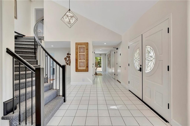 24851 Via Santa Cruz, Mission Viejo, CA 92692 - entrance foyer with stairway, light tile patterned flooring, lofted ceiling, and baseboards
