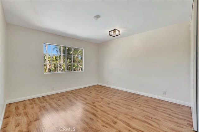 24851 Via Santa Cruz, Mission Viejo, CA 92692 - spare room with light wood-type flooring, baseboards, and a smoke detector