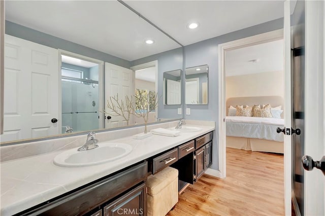 24851 Via Santa Cruz, Mission Viejo, CA 92692 - full bath featuring double vanity, wood finished floors, ensuite bath, and recessed lighting