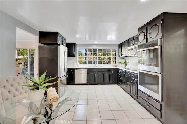 24851 Via Santa Cruz, Mission Viejo, CA 92692 - kitchen with stainless steel appliances, light countertops, a sink, plenty of natural light, and recessed lighting