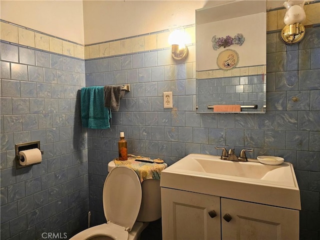 415 E Florinda St, Hanford, CA 93230 - half bath with tile walls, vanity, and toilet