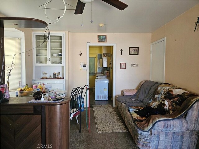 415 E Florinda St, Hanford, CA 93230 - living area featuring a ceiling fan and carpet