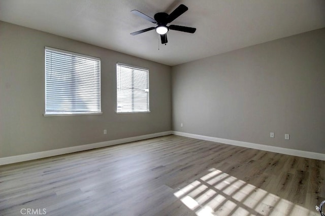 691 Pinot Blanc Ct, Los Banos, CA 93635 - unfurnished room with baseboards, wood finished floors, and ceiling fan
