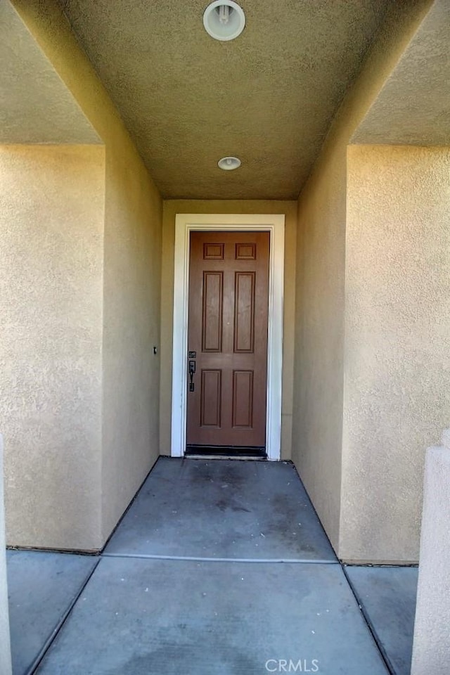 691 Pinot Blanc Ct, Los Banos, CA 93635 - view of exterior entry featuring stucco siding
