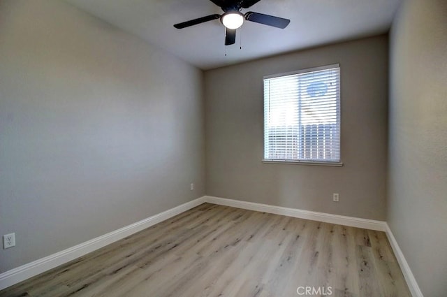 691 Pinot Blanc Ct, Los Banos, CA 93635 - empty room with wood finished floors, baseboards, and a ceiling fan