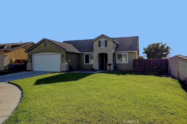 691 Pinot Blanc Ct, Los Banos, CA 93635 - traditional-style house with stucco siding, an attached garage, driveway, and a tiled roof