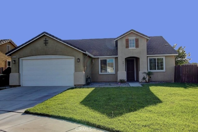691 Pinot Blanc Ct, Los Banos, CA 93635 - traditional-style home with stucco siding, a garage, driveway, and a tiled roof