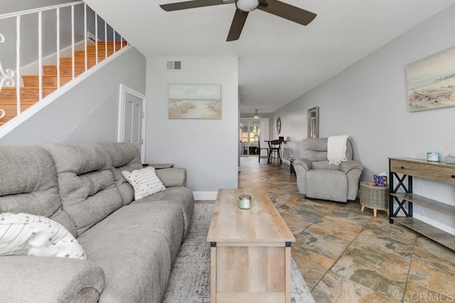 264 Espanas Gln, Escondido, CA 92026 - living room with stone finish flooring, a ceiling fan, stairs, and baseboards