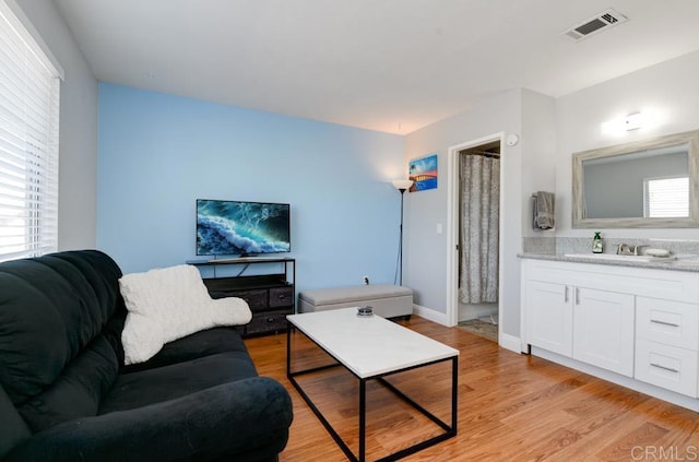 264 Espanas Gln, Escondido, CA 92026 - living room with light wood finished floors and baseboards