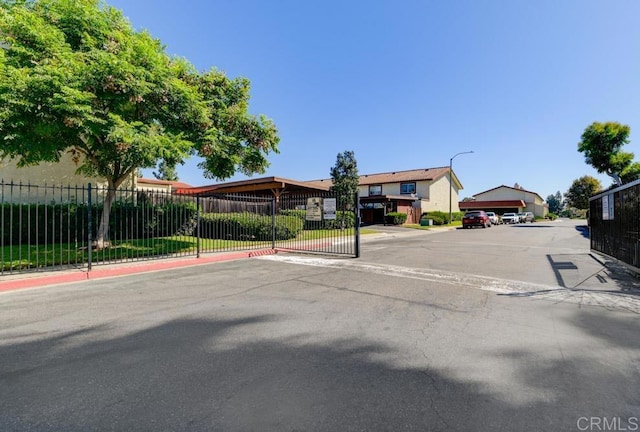 264 Espanas Gln, Escondido, CA 92026 - view of asphalt road with street lighting, curbs, and sidewalks