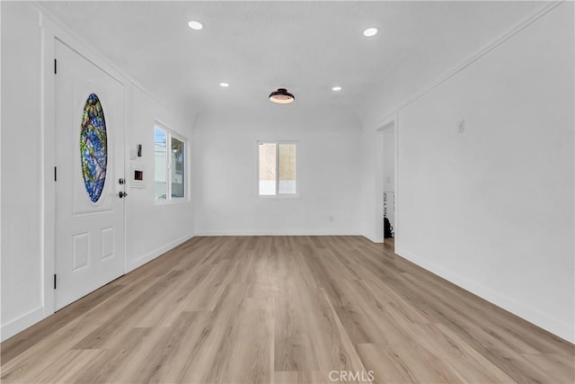 3140 Pluma St, Lynwood, CA 90262 - entryway featuring light wood-style floors and recessed lighting