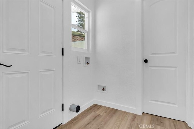3140 Pluma St, Lynwood, CA 90262 - laundry area featuring hookup for a washing machine and light wood finished floors