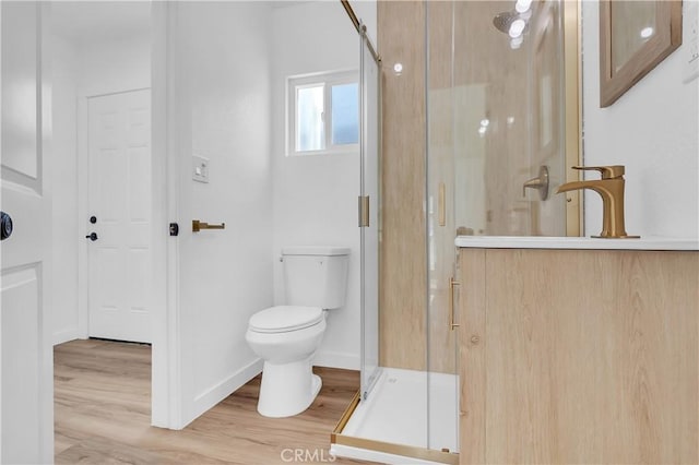 3140 Pluma St, Lynwood, CA 90262 - bathroom with a stall shower, wood finished floors, and vanity