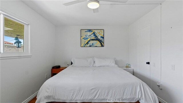 2413 N Deodar St Unit 3, Santa Ana, CA 92705 - bedroom with ceiling fan and baseboards