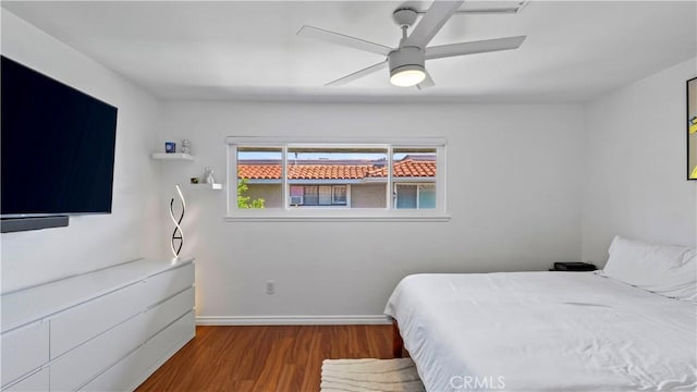 2413 N Deodar St Unit 3, Santa Ana, CA 92705 - bedroom featuring wood finished floors, baseboards, and a ceiling fan