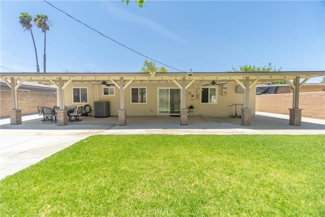 5611 Harold St, Riverside, CA 92503 - rear view of house featuring ceiling fan, a patio area, cooling unit, and stucco siding
