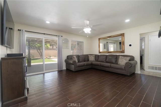 5611 Harold St, Riverside, CA 92503 - living room featuring a ceiling fan, dark wood-type flooring, baseboards, and recessed lighting