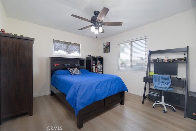 5611 Harold St, Riverside, CA 92503 - bedroom featuring light wood-style floors, baseboards, and a ceiling fan