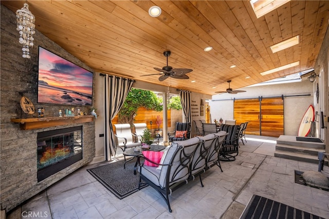 4538 Conquista Ave, Lakewood, CA 90713 - view of patio / terrace featuring an outdoor stone fireplace, outdoor dining space, and a ceiling fan
