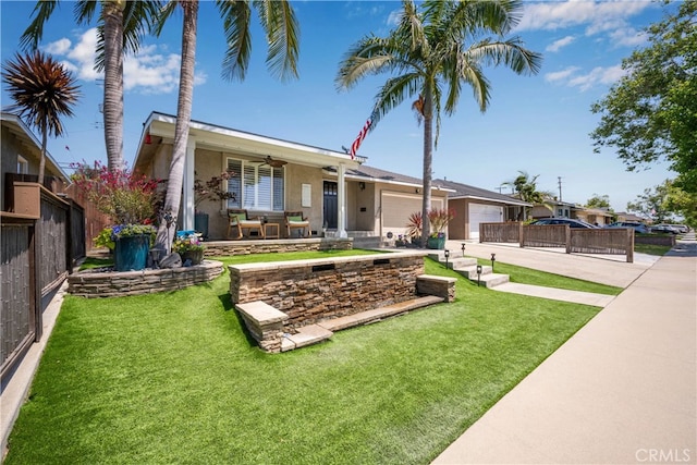 4538 Conquista Ave, Lakewood, CA 90713 - single story home with an attached garage, concrete driveway, stucco siding, and ceiling fan