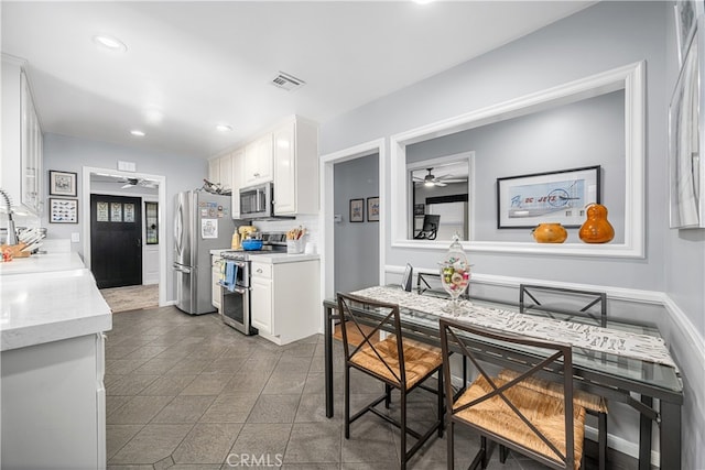 4538 Conquista Ave, Lakewood, CA 90713 - dining space with ceiling fan and recessed lighting