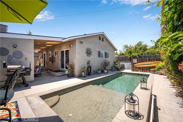 4538 Conquista Ave, Lakewood, CA 90713 - view of swimming pool with a patio, a jacuzzi, and a fenced backyard