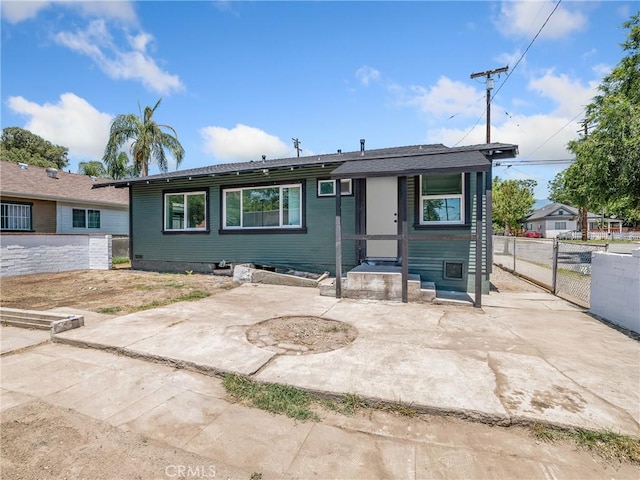 257 W 11th St, San Bernardino, CA 92410 - view of front of home with a patio and a gate