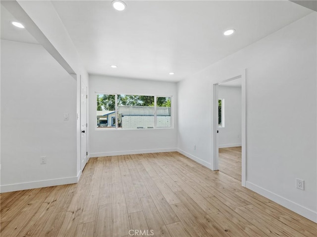 257 W 11th St, San Bernardino, CA 92410 - unfurnished room featuring light wood-style floors, baseboards, and recessed lighting