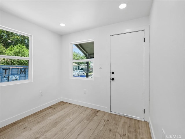 257 W 11th St, San Bernardino, CA 92410 - foyer featuring light wood-type flooring, plenty of natural light, baseboards, and recessed lighting