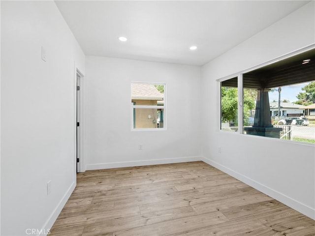 257 W 11th St, San Bernardino, CA 92410 - empty room with wood finished floors, baseboards, and recessed lighting
