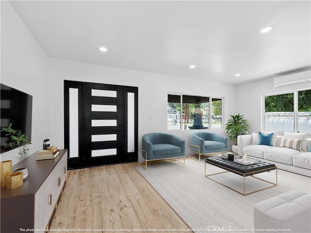 257 W 11th St, San Bernardino, CA 92410 - living area with a wall mounted air conditioner, light wood-style flooring, and recessed lighting