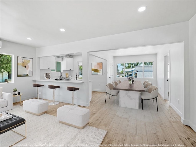 257 W 11th St, San Bernardino, CA 92410 - living room with plenty of natural light, baseboards, light wood-style flooring, and recessed lighting