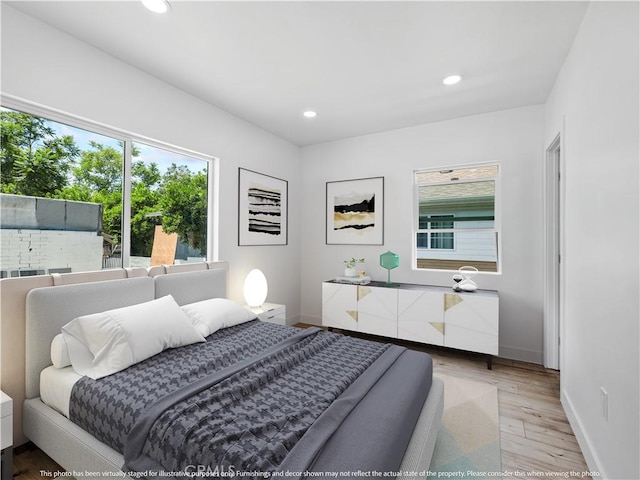 257 W 11th St, San Bernardino, CA 92410 - bedroom featuring baseboards, wood finished floors, and recessed lighting