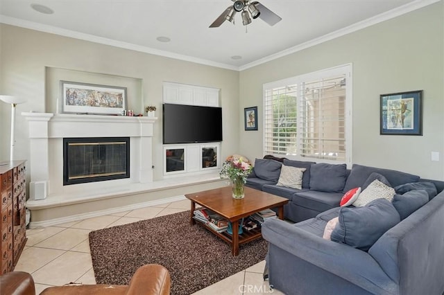 26800 Fairlain Dr, Valencia, CA 91355 - living area featuring light tile patterned floors, crown molding, a ceiling fan, and a glass covered fireplace