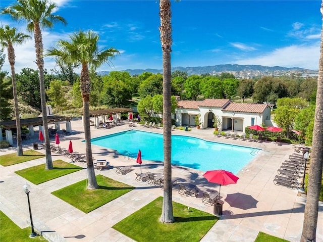 26800 Fairlain Dr, Valencia, CA 91355 - community pool featuring a mountain view and a patio