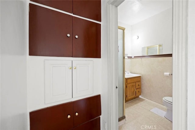 1222 N Virgil Ave, Los Angeles, CA 90029 - bathroom with vanity, toilet, and tile patterned floors